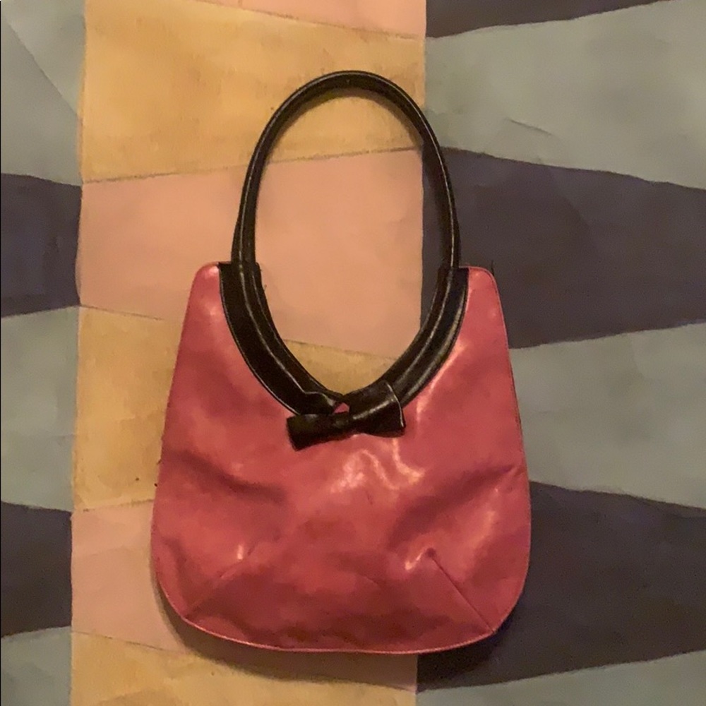 Pink purse with black bow